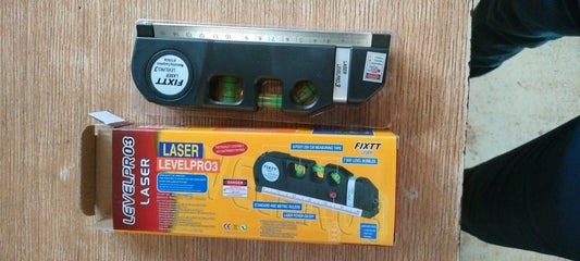 4-in-1 Laser LevelPro3 distance meter and measuring tool with spirit level, measuring tape, and ruler, shown with retail packaging for DIY, construction, and home use