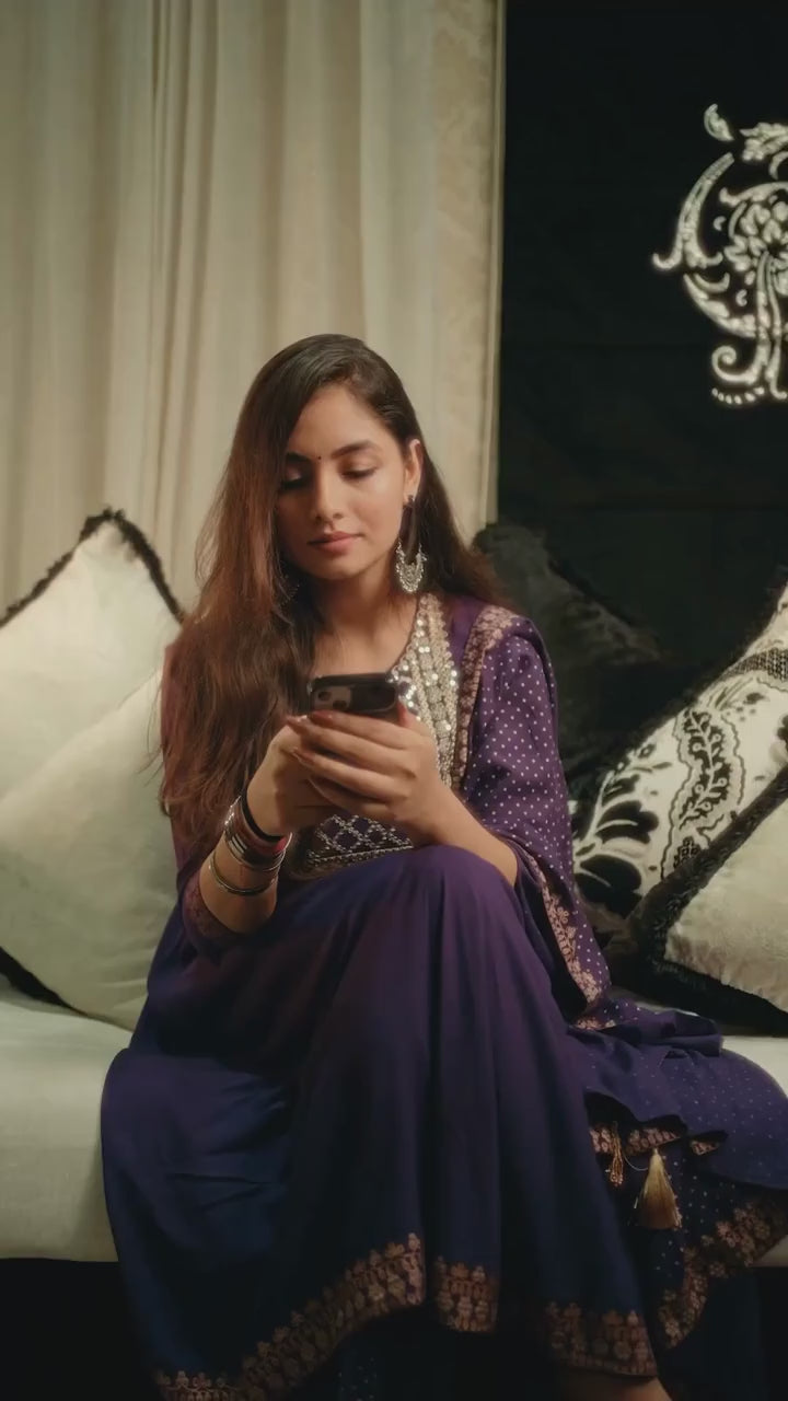 Raksha Bandhan celebration video featuring a brother and sister performing rakhi tying ceremony, with a black "Brother" temperature bottle and two designer rakhi bracelets as gifts
